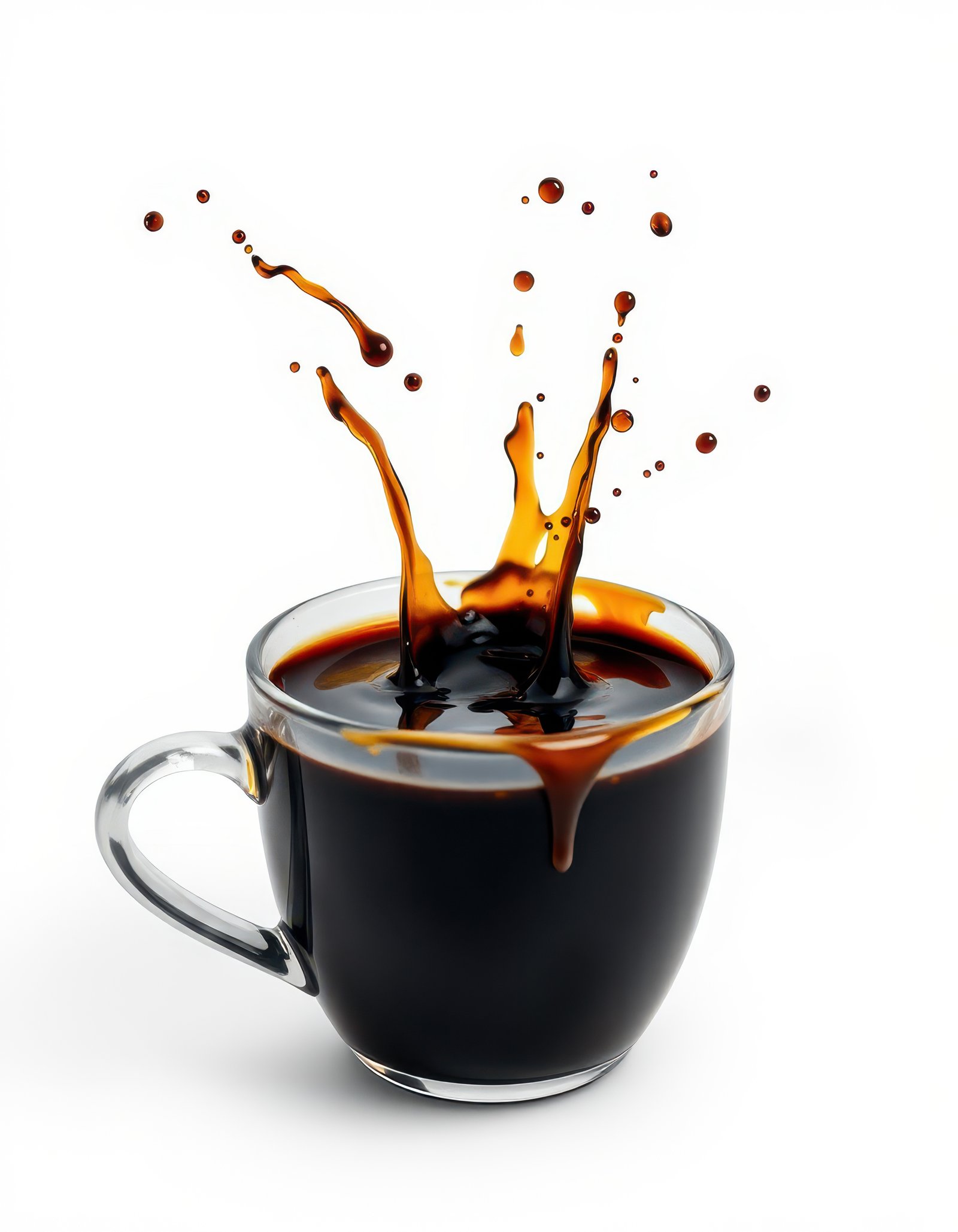Hot coffee splashes energetically from a glass cup against a white background in a dynamic display of liquid motion
